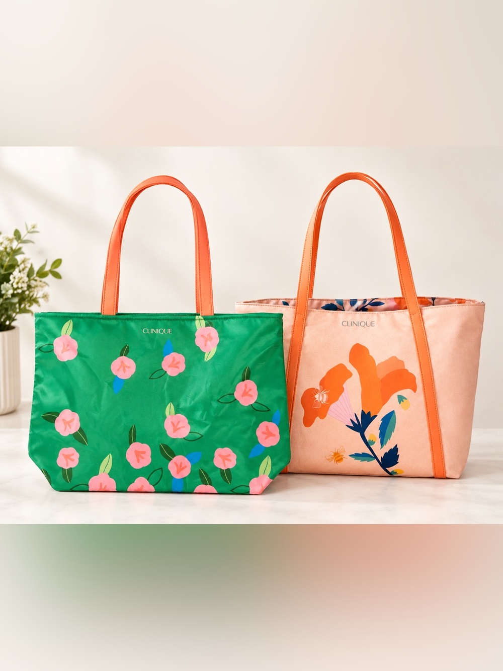 Pick one Clinique Green Floral Tote & Peach Floral Companion